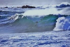 Surfer Stephen Sharpe backdooring a big barrel at Coogee - “the Southie” just offshore.
